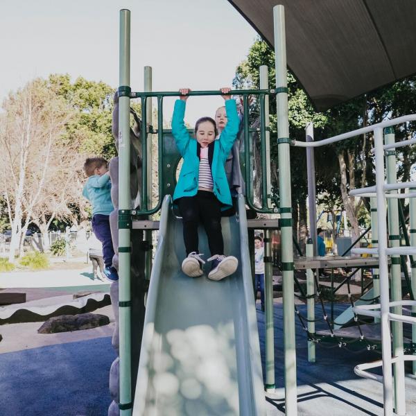 Young girl on slide at Maitland Park