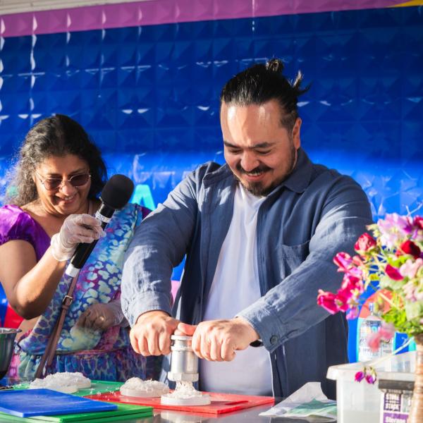 Adam Liaw cooking at Maitland Riverlights demonstration stage