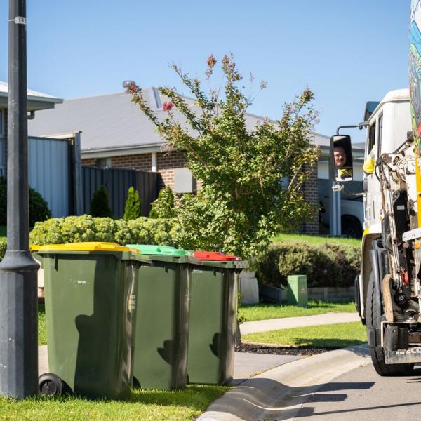 Three bins place on kerbside