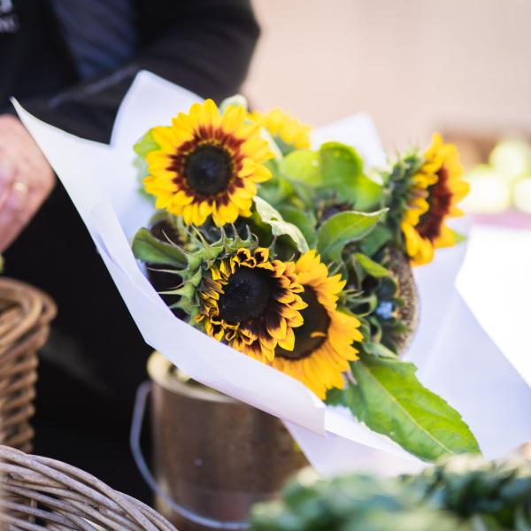 Sunflowers at market stall