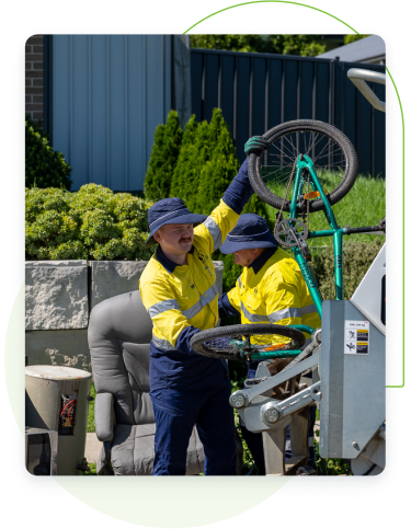 Council staff removing kerbside waste