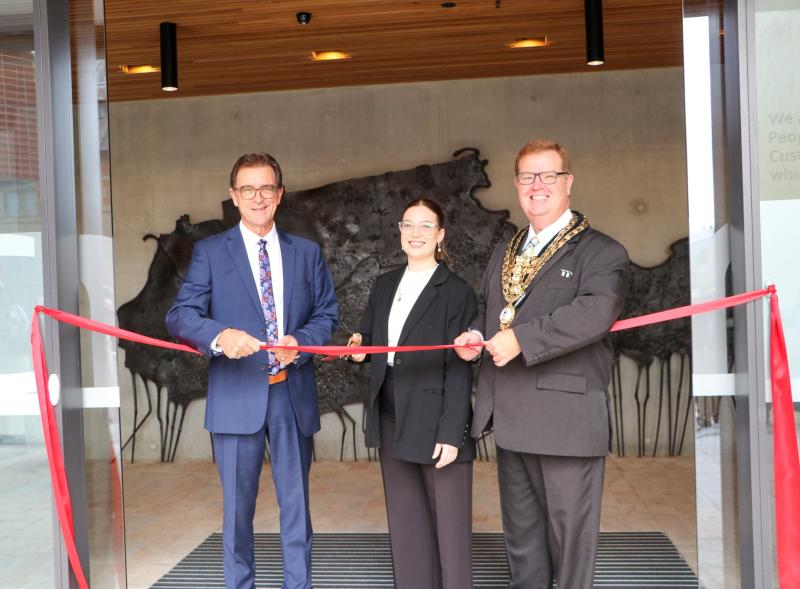 General Manager David Evans with Maya Young and Mayor Philip Penfold