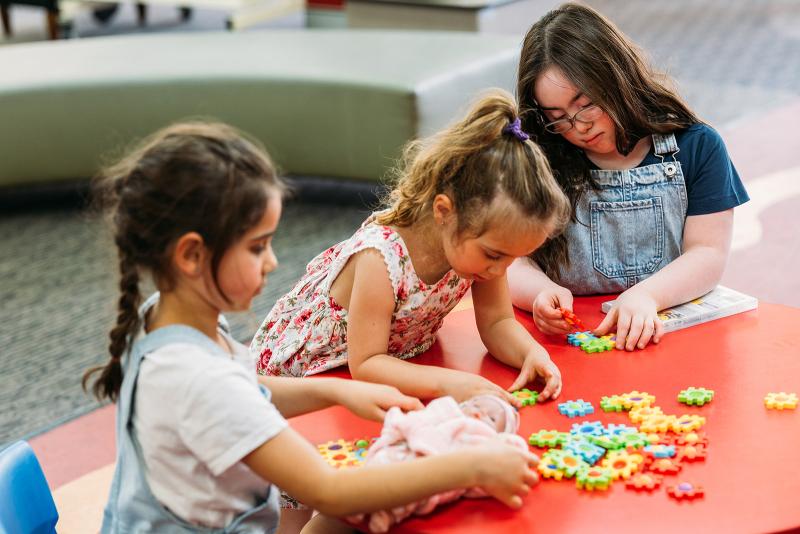 kids playing with toys at the library