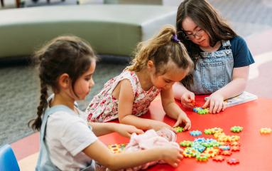 kids playing with toys at the library