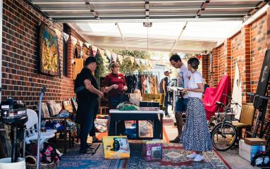 Sellers and shoppers participating in the Garage Sale Trail