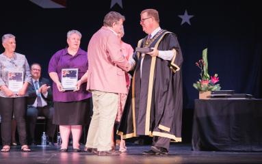 Mayor presents award to winner