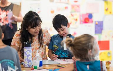 A mother and son participating in Free Art January at Maitland Regional Art Gallery.