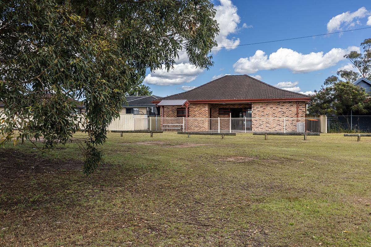 Grass area and Bruce St Community Hall