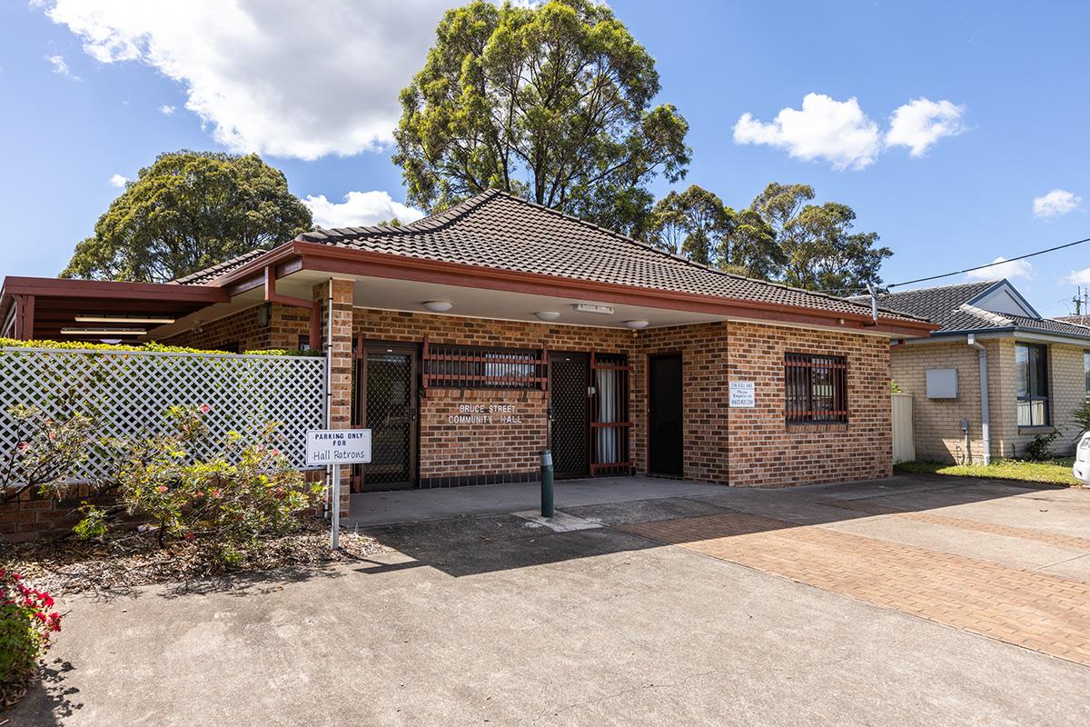 Entrance to community hall and parking spot