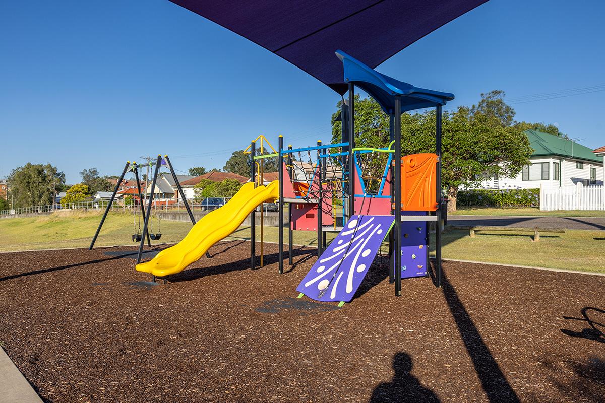 Playground under sun shade of Centennial Park 