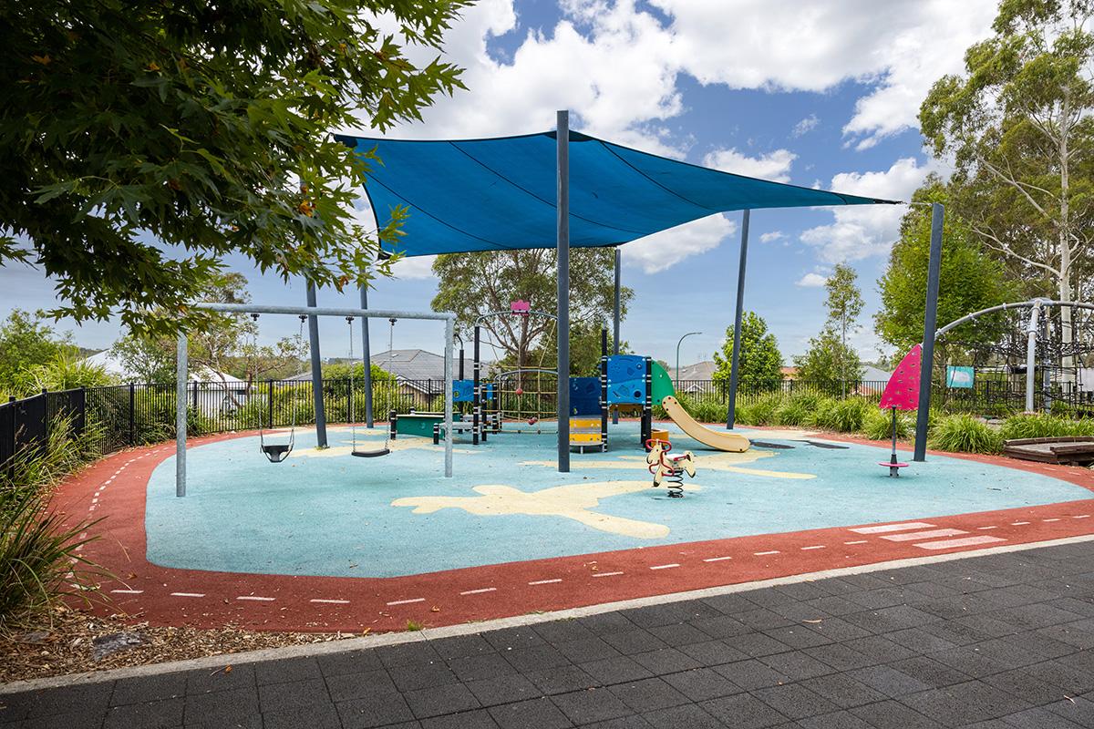 Swing set and side view of playground 