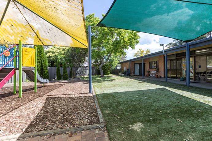 Shade sail and grass area