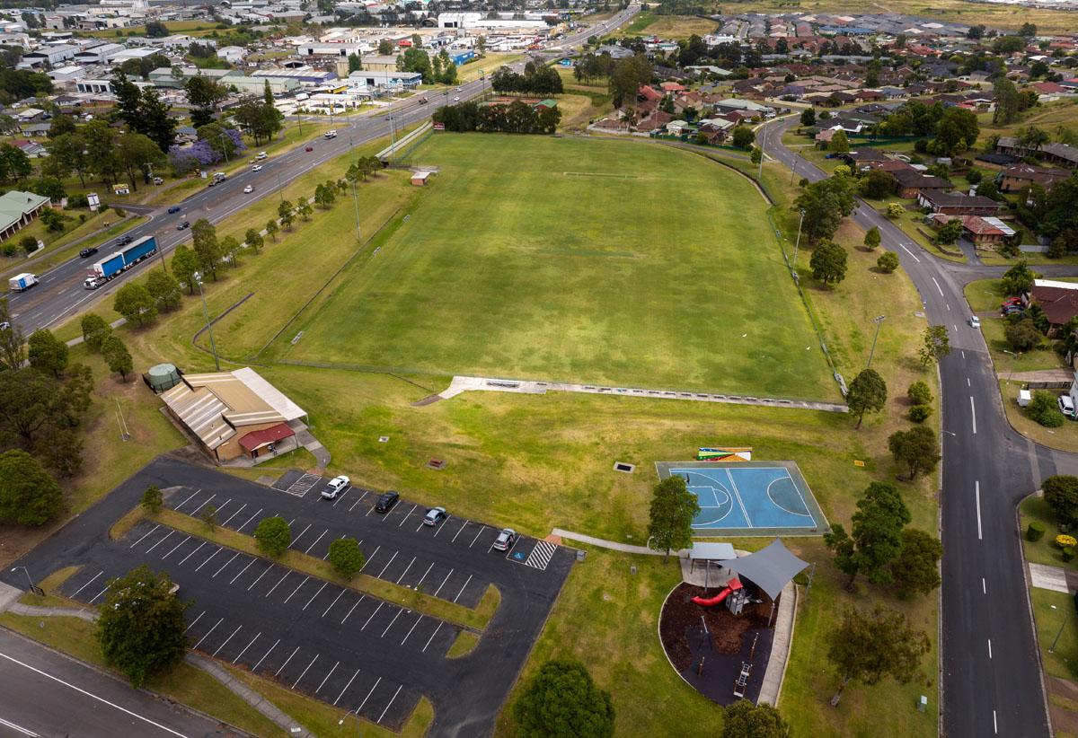 Aerial view of oval, carpark and amenities