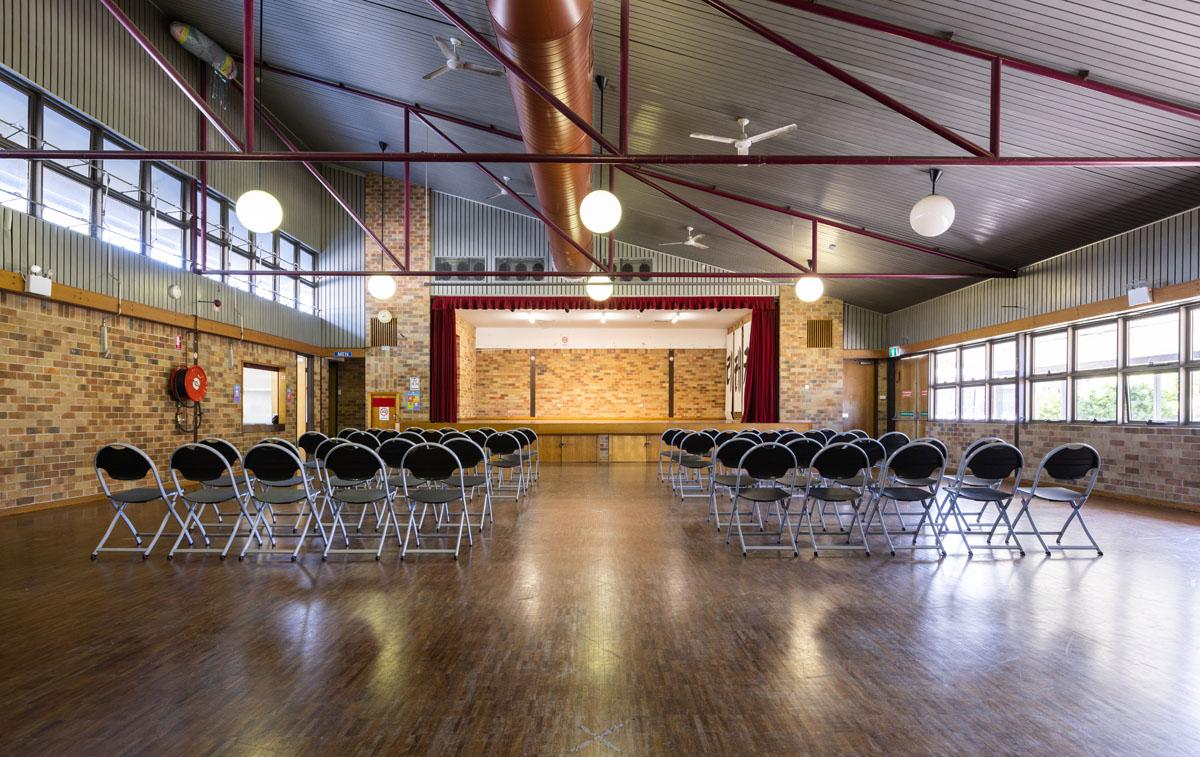 Hall with chairs facing stage