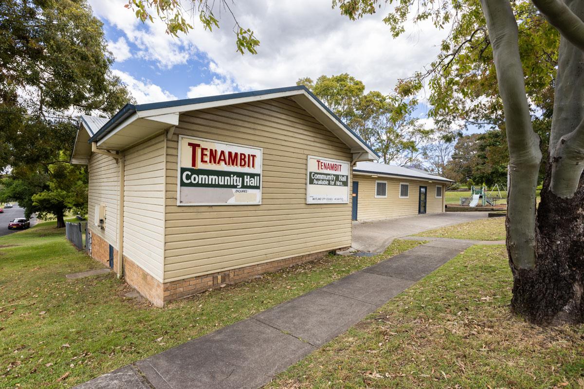 Grass area, playground in the distance at Tenambit Community Hall 