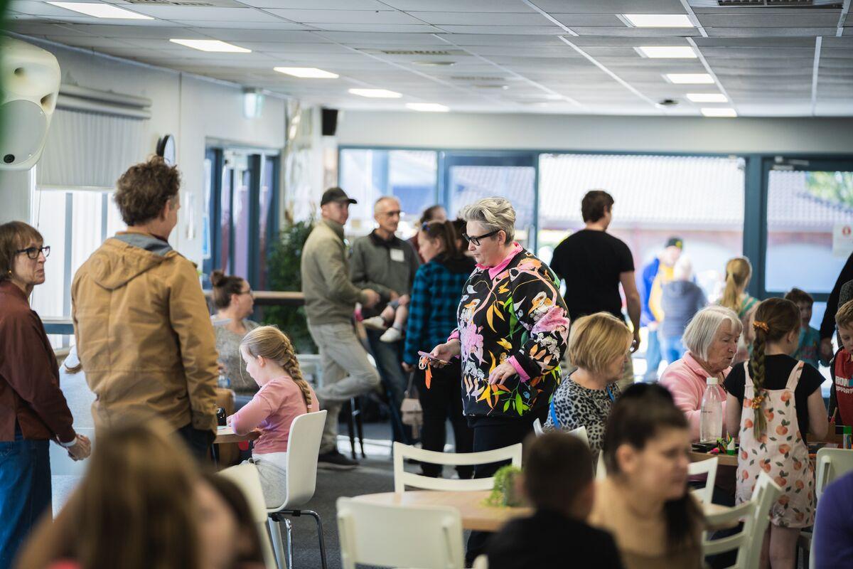 Community members gathered in a meeting room