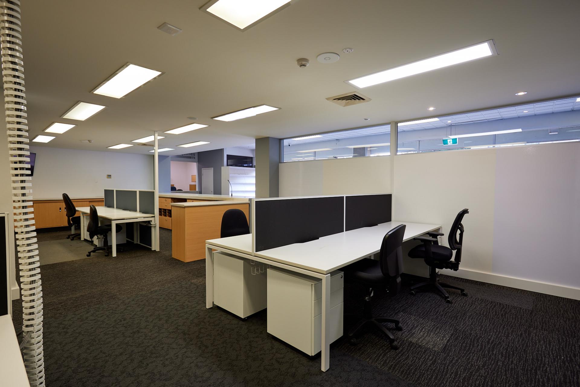 Desks behind reception 